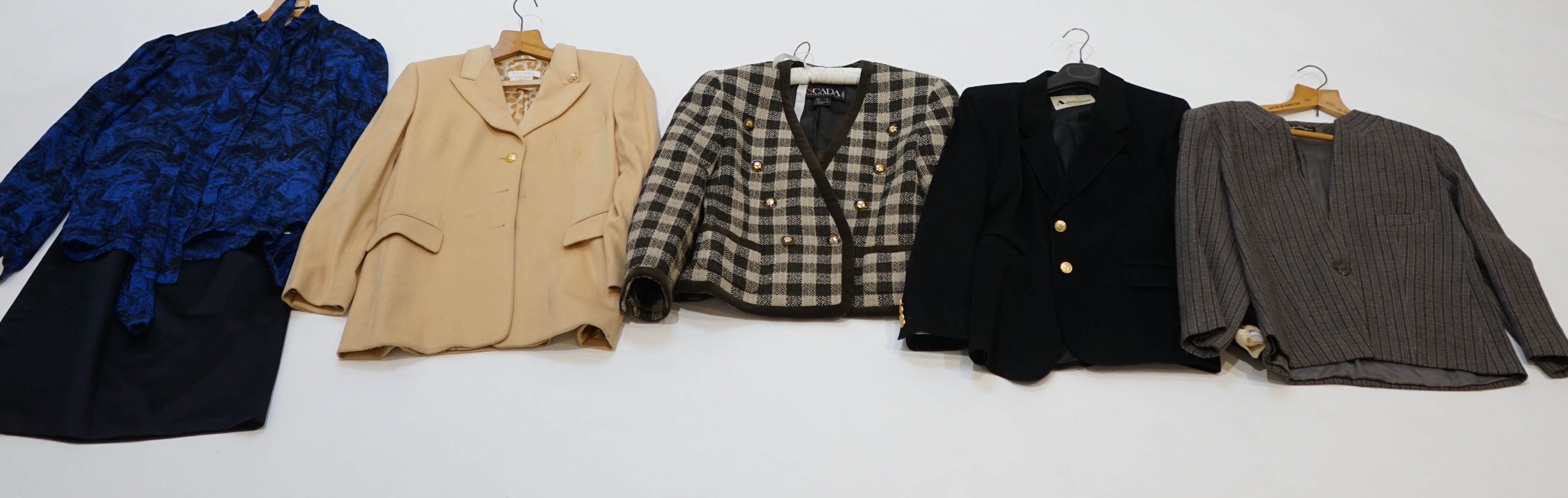 A group of assorted designer clothes, two Escarda jackets, one Aquascutum blazer, one Salvatore Ferragamo jacket (all UK size 16) and one black satin skirt by Emmanuel Ungaro size 10, and Lanvin silk blouse size IT 44